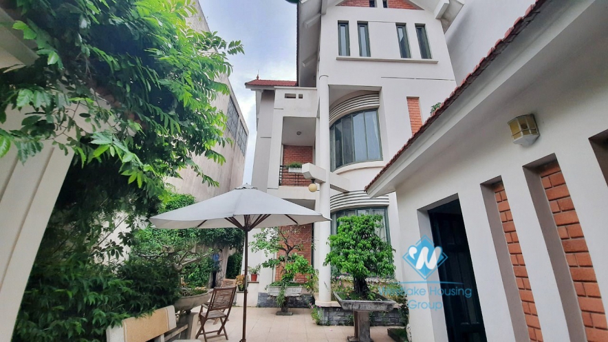 House with four bedrooms and large green garden space for rent in Ngoc Thuy Long Bien